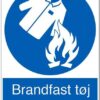 Brandfast tøj påbudt. Påbudsskilt