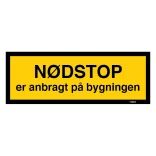 Nødstop er anbragt på bygningen. Bygningsskilt
