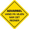 Advarsel Vand på vejen når det regner
