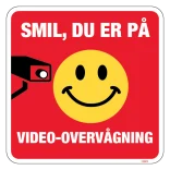 Smil du er på Video-overvågning Skilt (hvid på rød)